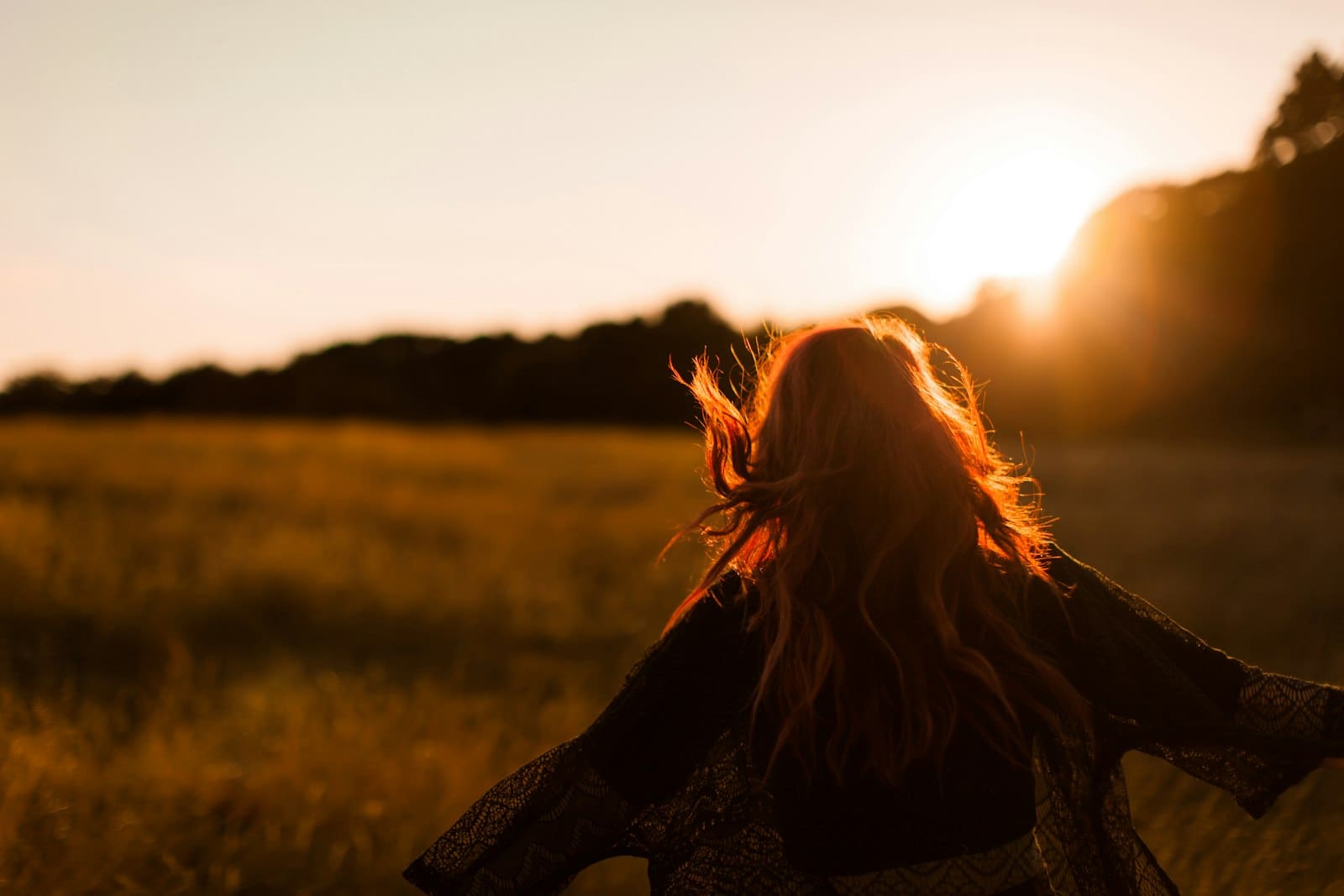 Woman standing outdoors during midlife, illustrating menopause wellness and HRT with semaglutide weight loss